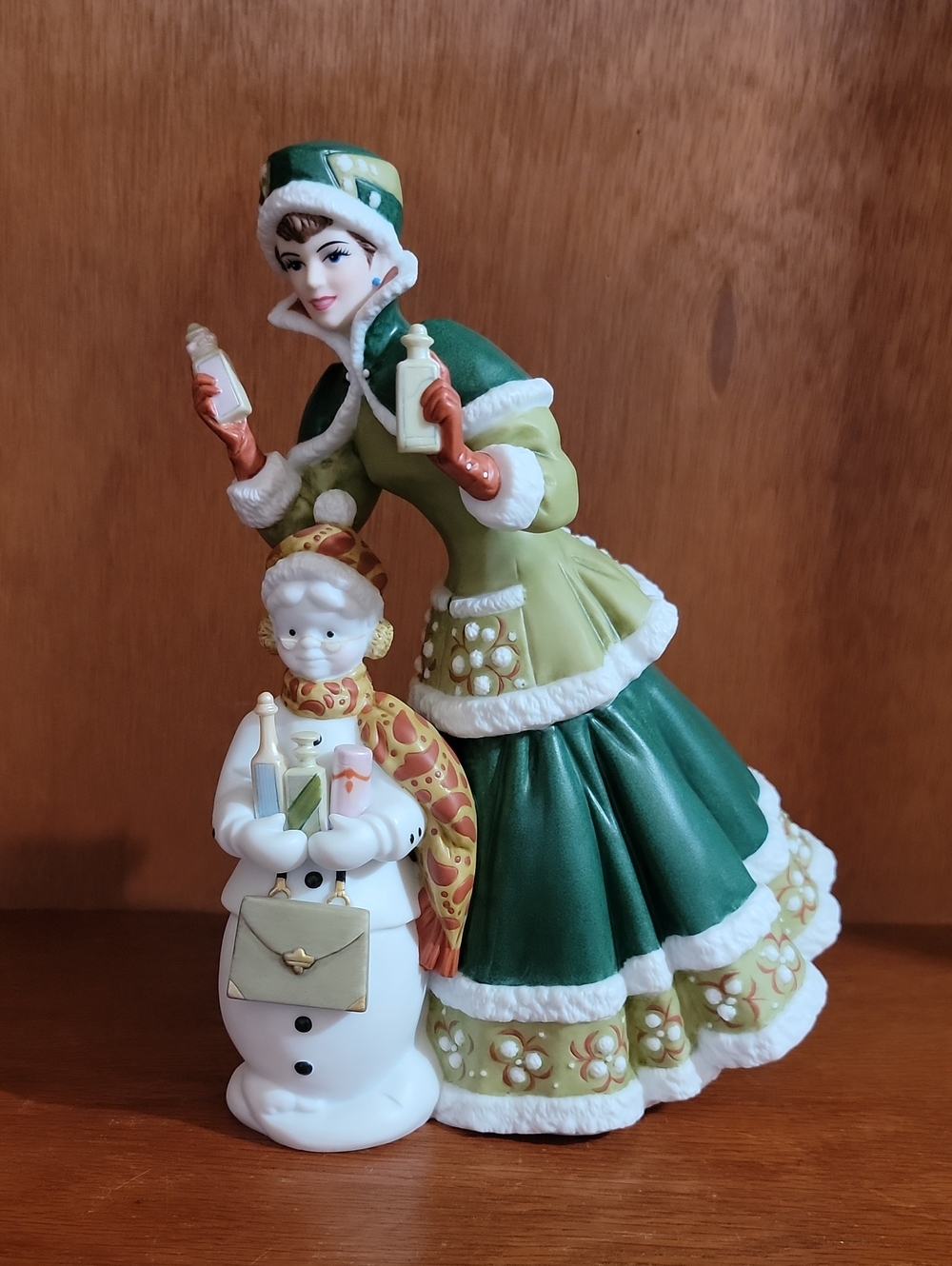 Avon 2003 Mrs Albee Award Green Victorian Lady and Snowman Holiday Figurine
